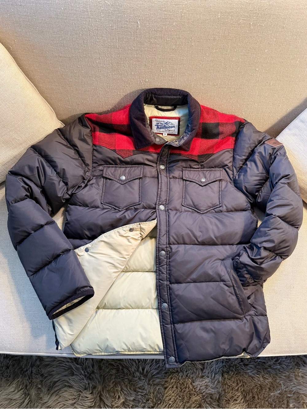Penfield black down Puffer Jacket with Red Buffalo Plaid Yoke.